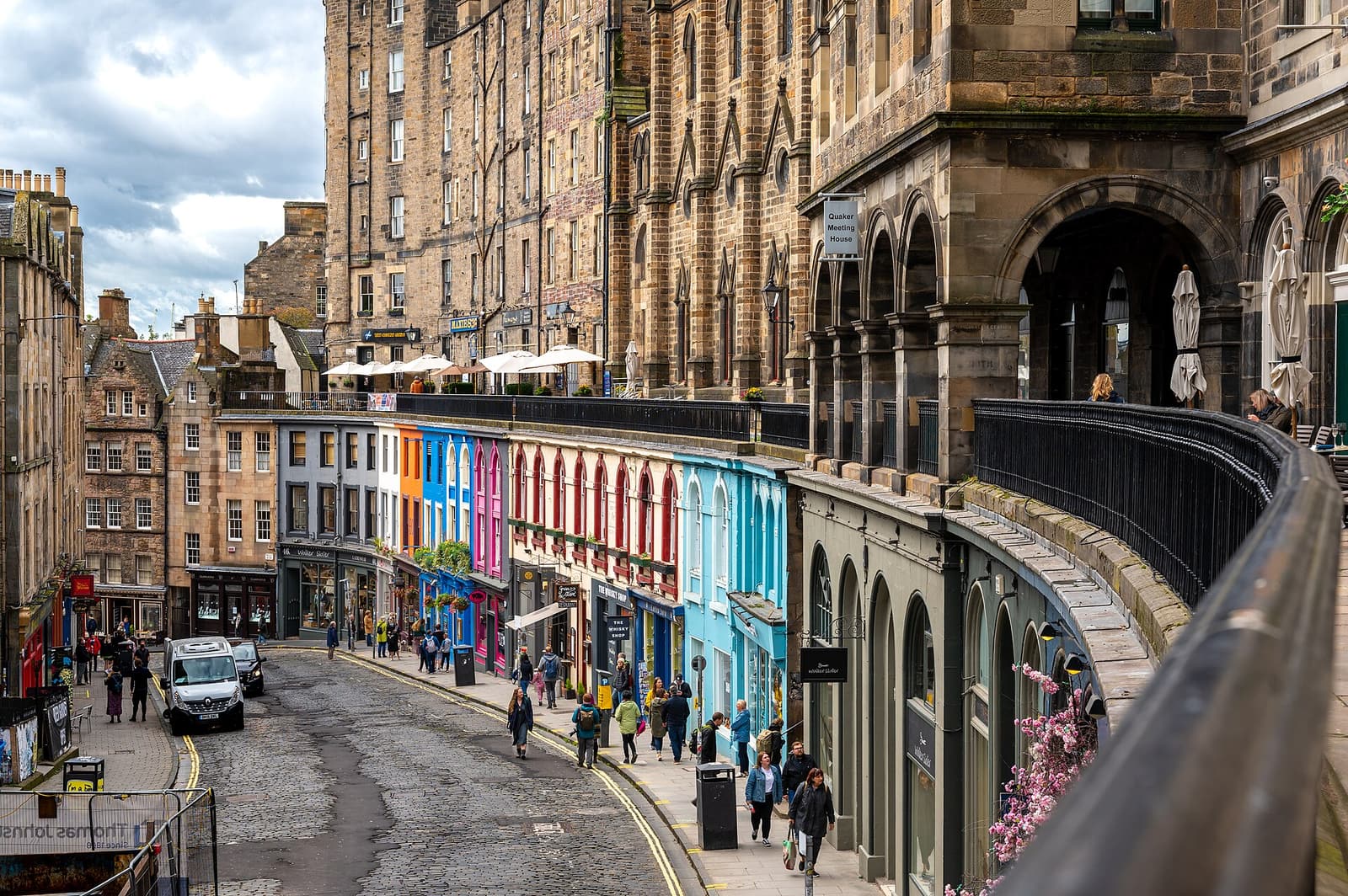The curving row of colourful shopfronts on Victoria Street in Edinburgh’s Old Town